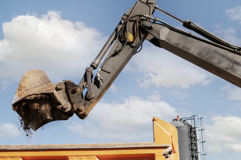 excavator-digging-ground-day-light